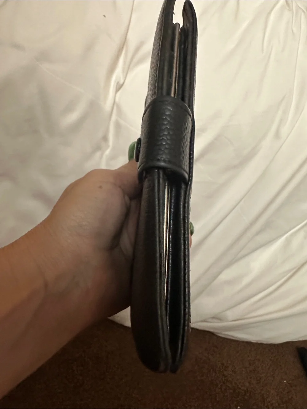 CHANEL Black Quilted CC Caviar Leather wallet.